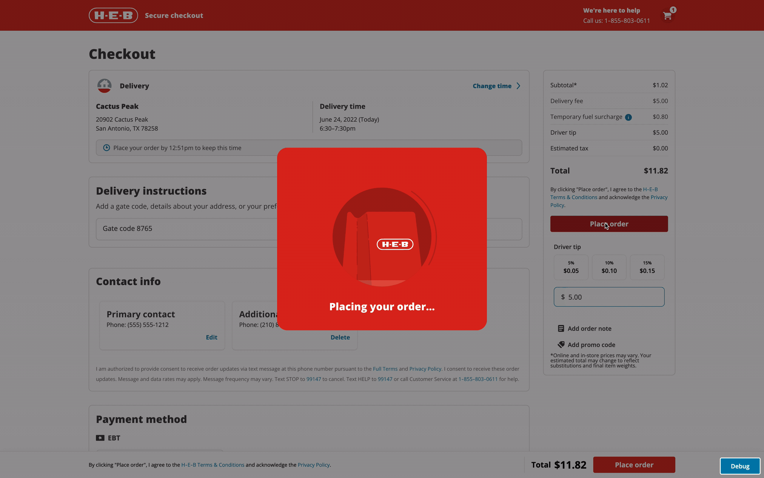 Animation: Background of H-E-B checkout page for desktop web with a darken background overlay and a modal on the center of the screen with a grocery bag animation of various grocery items bouncing and swapping with text that reads "Placing your order" and switches to "Hang tight"